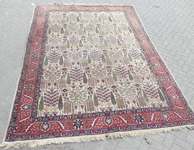 Lot 744 - A Persian woollen red, blue and cream ground...