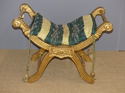 Lot 643 - A decorative gilt wood X-frame dressing stool,...