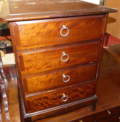 Lot 676 - A Stag Minstrel low chest of four short over...