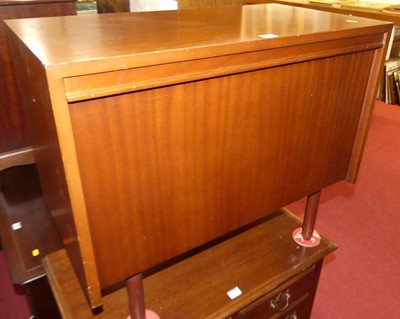 Lot 677 - A 1970s teak fall front single door record...