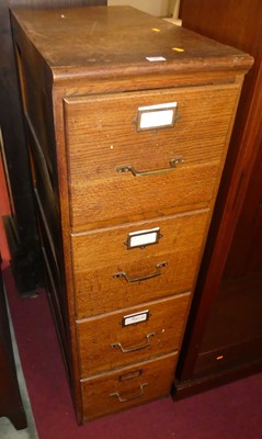 Lot 681 - An oak four-drawer office filing chest, width...