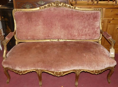 Lot 687 - A French floral carved and crested gilt wood...