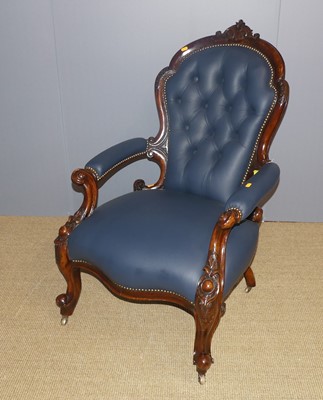 Lot 690 - A mid-Victorian floral carved walnut framed...