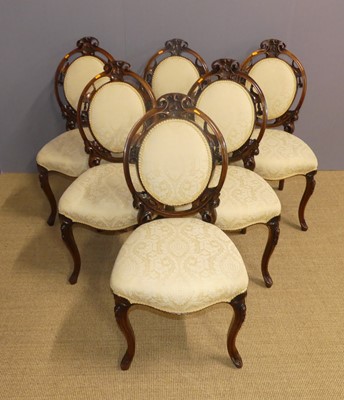 Lot 700 - A set of six mid-Victorian floral carved and...