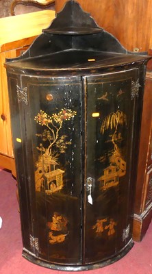 Lot 710 - An 18th century chinoiserie black lacquered...