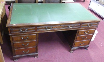 Lot 679 - An Edwardian mahogany twin pedestal writing...