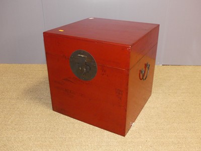 Lot 723 - An Oriental red lacquered cube shaped chest,...