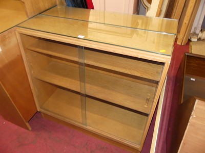 Lot 726 - A pair of 1970s G-Plan blond oak slanted low...