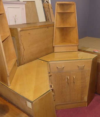 Lot 727 - A pair of 1970s G-Plan blond oak low corner...