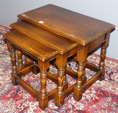 Lot 731 - A contemporary joined and moulded oak nest of...