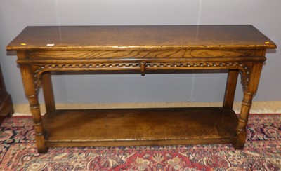 Lot 732 - A contemporary joined oak two-tier hall table,...