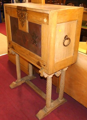 Lot 733 - A Spanish blond oak and embossed leather inset...
