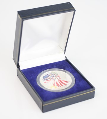 Lot 181 - United States of America, 1999 colourised 1oz...
