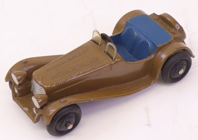 Lot 875 - Dinky Toys No.38F SS Jaguar in off brown body...