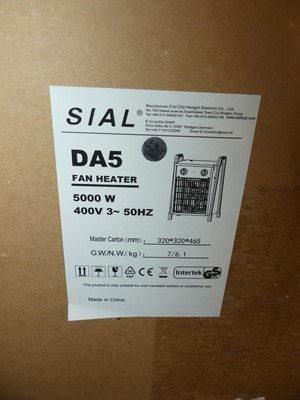 Lot 483 - A Sial DA5 fan heater; together with two Sial...