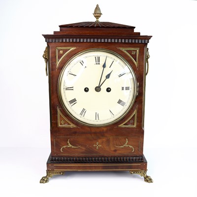 Lot 52 - A Regency mahogany and brass inlaid bracket...