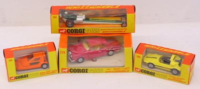 Lot 91 - Corgi Toys whizzwheels group of four diecast,...
