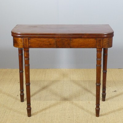 Lot 661 - A regency mahogany and crossbanded D-shaped...