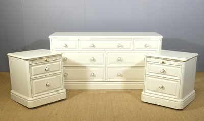 Lot 649 - A white wood low bedroom chest with multiple...