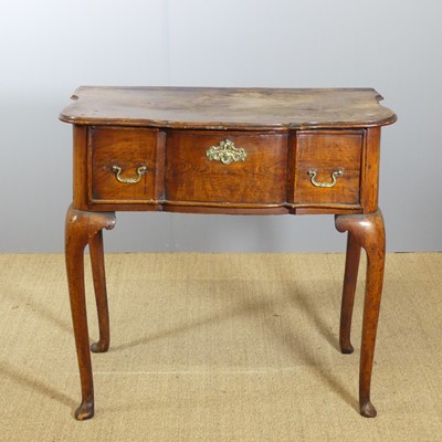 Lot 647 - A provincial George III fruitwood single...