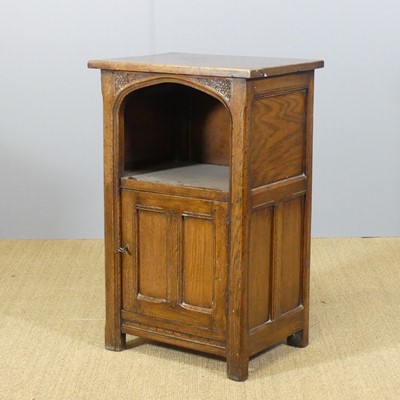 Lot 731 - A small joined oak single door side cupboard,...