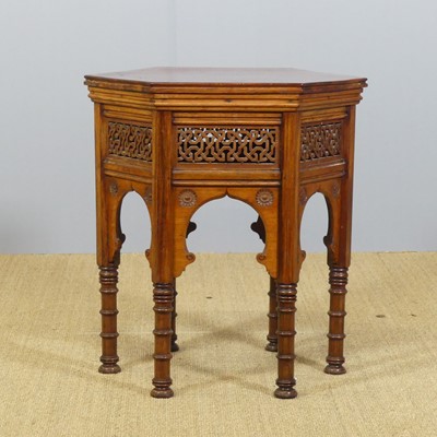Lot 692 - A North African hardwood hexagonal topped low...