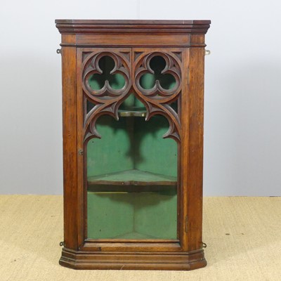 Lot 694 - A late Victorian Gothic Revival oak single...