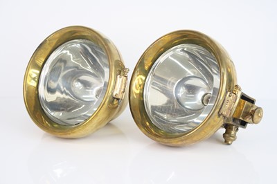 Lot 7 - A pair of early 20th century brass cased car...