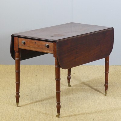Lot 696 - A Regency mahogany Pembroke table, raised on...