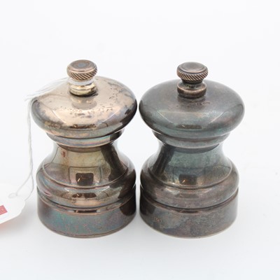 Lot 223 - A late 20th century silver salt and pepper duo,...