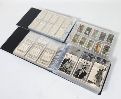 Lot 22 - An album of cigarette cards to include State...