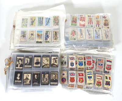 Lot 24 - A large collection of cigarette cards to...