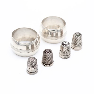 Lot 238 - Four silver thimbles, to include examples by...