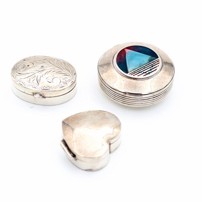 Lot 241 - Three silver pill boxes, comprising a circular...