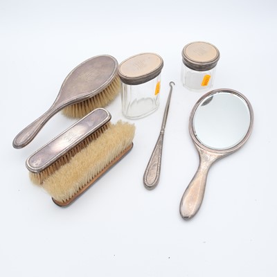 Lot 263 - A George V silver-backed dressing table set,...
