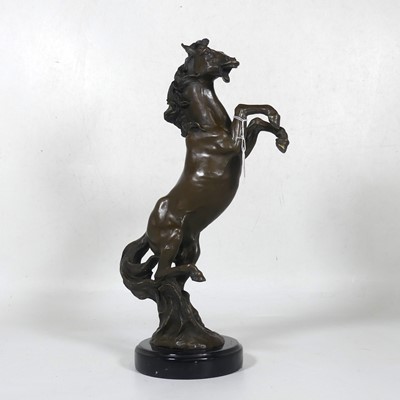 Lot 7 - A contemporary bronzed metal figure of a...