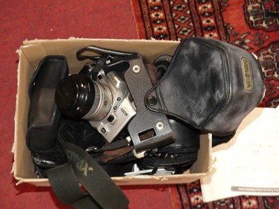 Lot 64 - A collection of cameras, to include a Minolta...