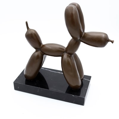 Lot 18 - A reproduction bronzed metal figure of a dog,...