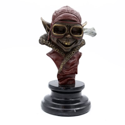 Lot 26 - A reproduction bronzed metal bust of a pixie...