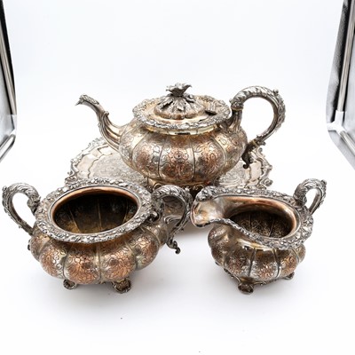 Lot 27 - A 19th century silver-plated three-piece...