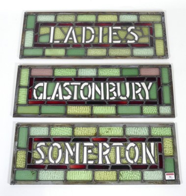 Lot 36 - A set of three stained leaded glass panels,...