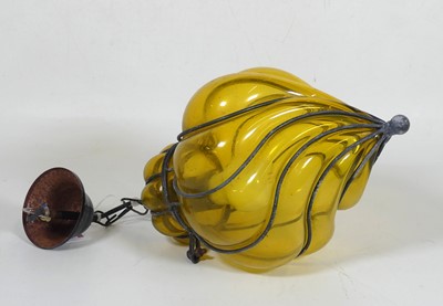 Lot 39 - A green glass ceiling light, of a wrythern...