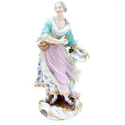 Lot 70 - A pair of Meissen porcelain figures of a lady...