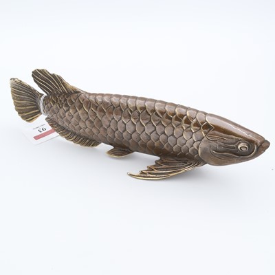 Lot 93 - A reproduction bronzed metal model of a fish,...