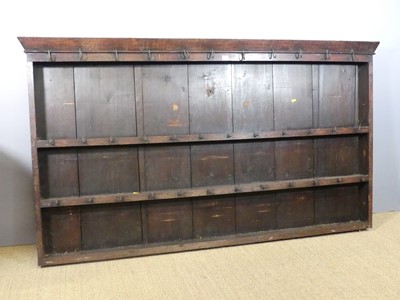 Lot 602 - An 18th century oak tiered delft rack, w.182cm