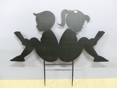 Lot 604 - A black painted cut metal garden silhouette,...