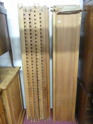 Lot 608 - A contemporary walnut sectional bookshelf...