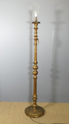 Lot 609 - A carved floral-decorated and fluted giltwood...