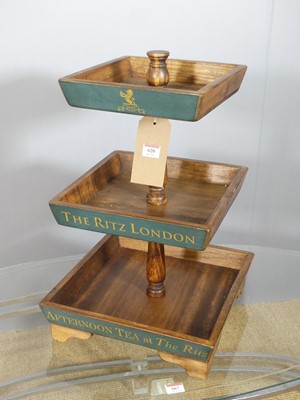 Lot 620 - A contemporary stained pine tiered and...
