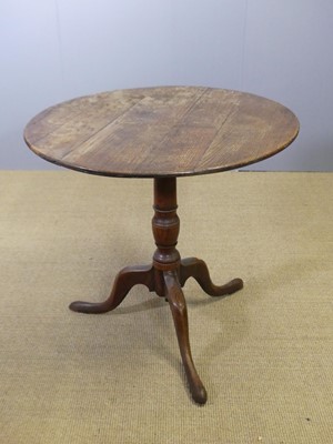 Lot 745 - A circa 1800 provincial oak and elm tilt-top...